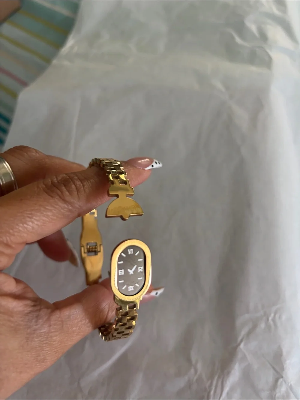 Elegant Women's Gold-Tone Bracelet Watch with Black Dial NOT REAL watch